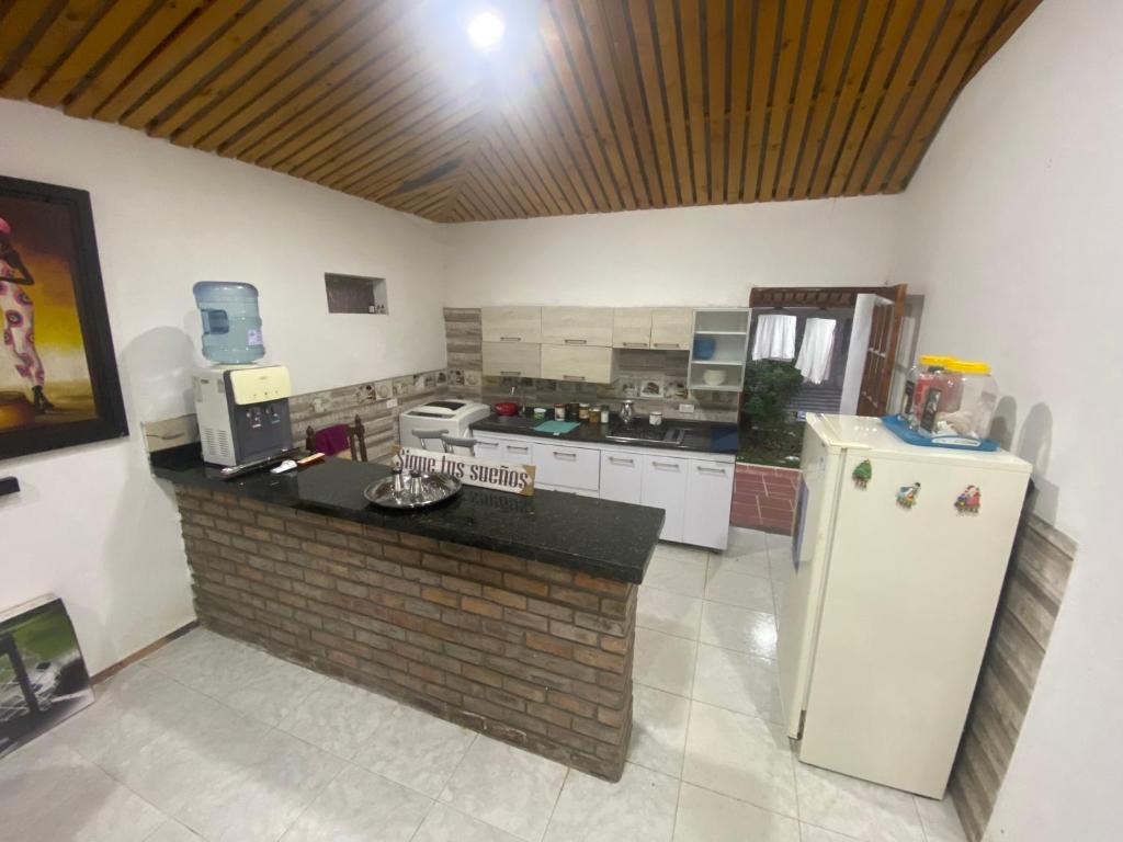 Kuchyň nebo kuchyňský kout v ubytování Casa de descanso acacias meta