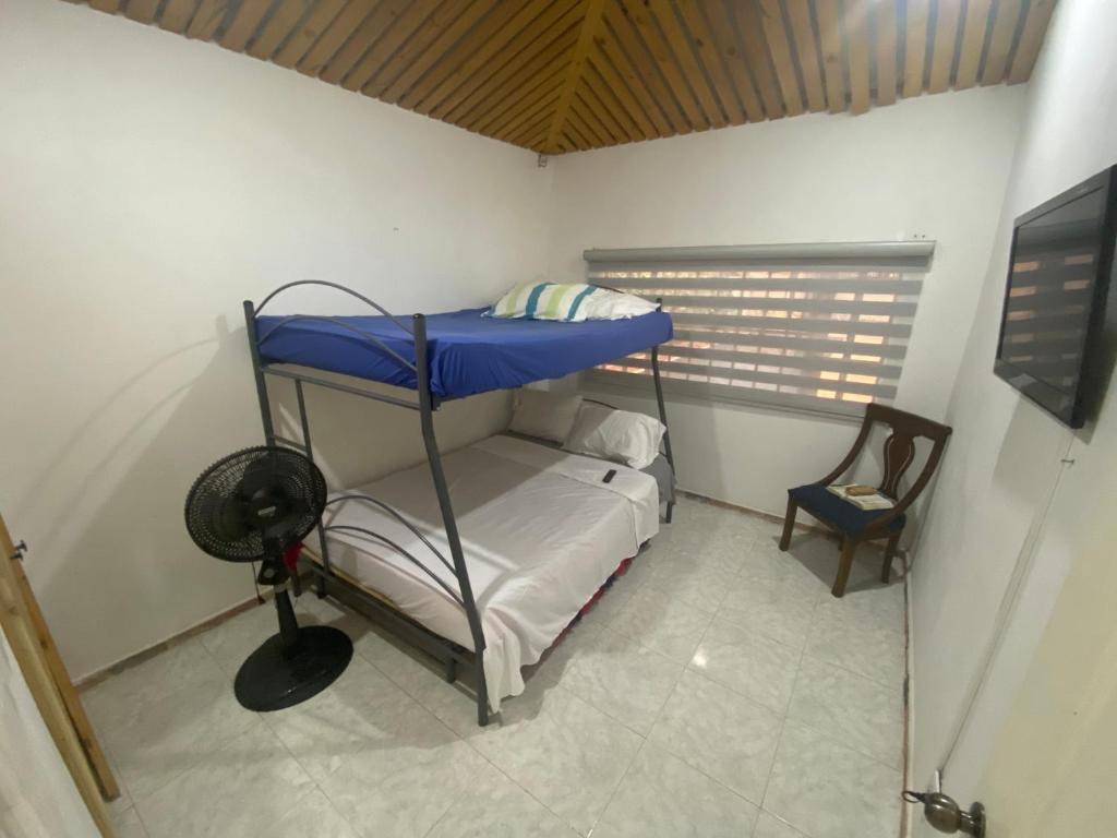 Postel nebo postele na pokoji v ubytování Casa de descanso acacias meta