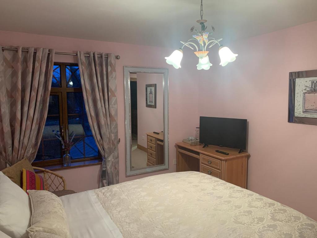 Postel nebo postele na pokoji v ubytování Mayrone House B&B