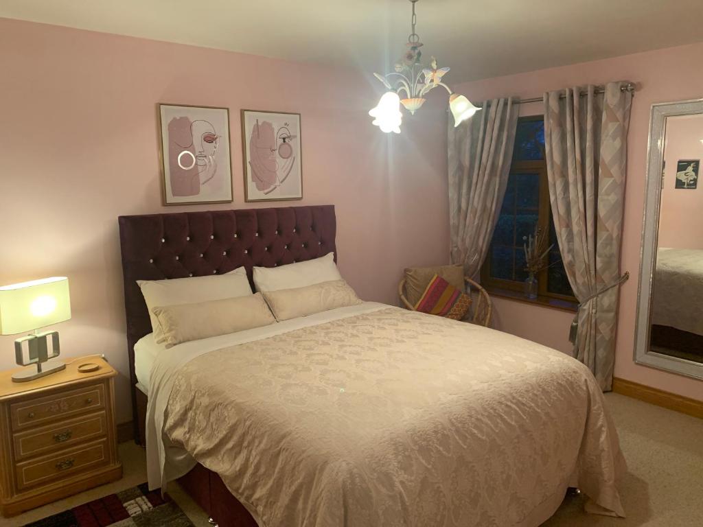 Postel nebo postele na pokoji v ubytování Mayrone House B&B
