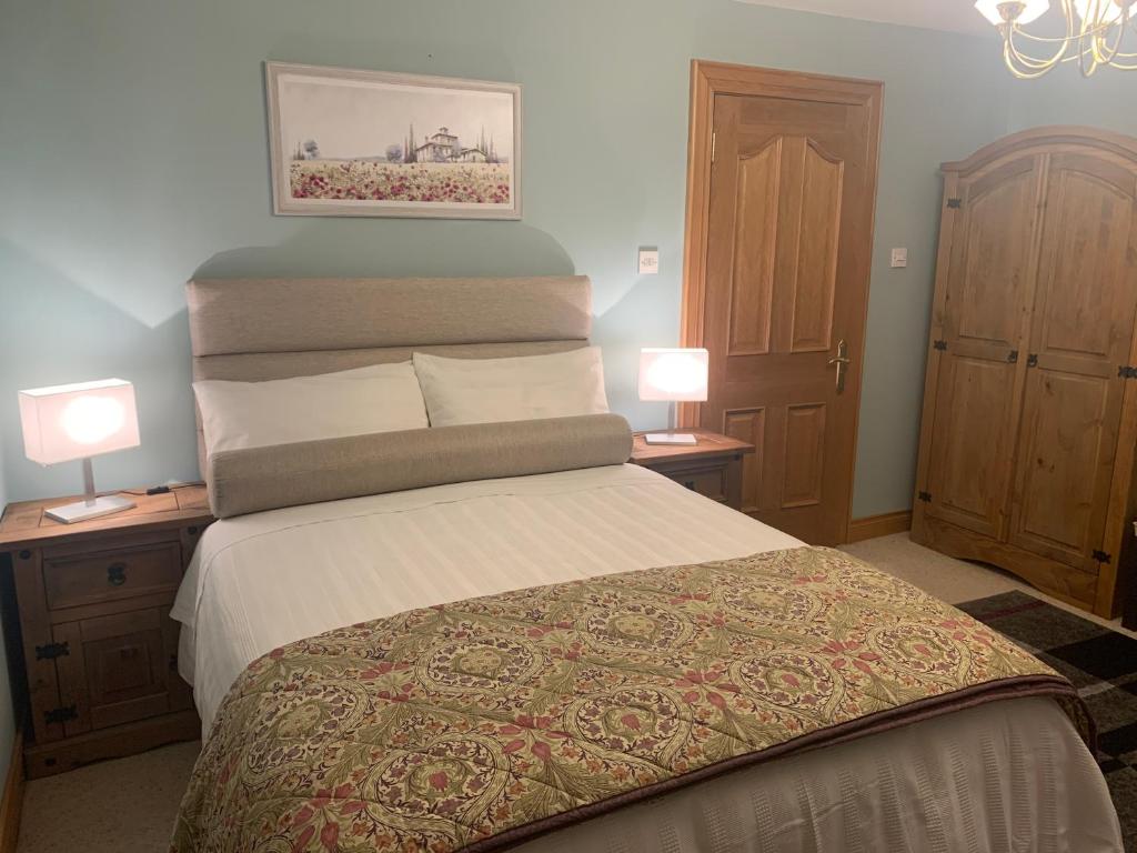 Postel nebo postele na pokoji v ubytování Mayrone House B&B