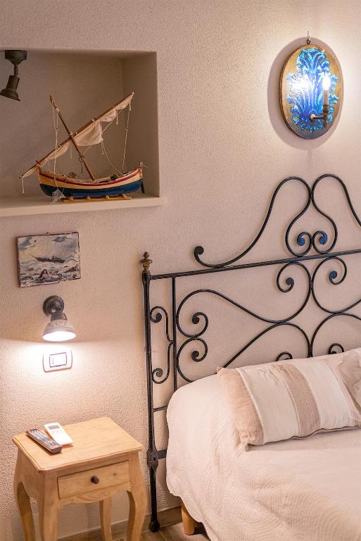 A bed or beds in a room at Affittacamere Irene
