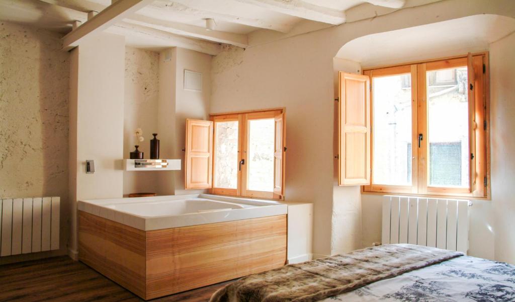 Posteľ alebo postele v izbe v ubytovaní Clauhomes Casa Rural Deluxe