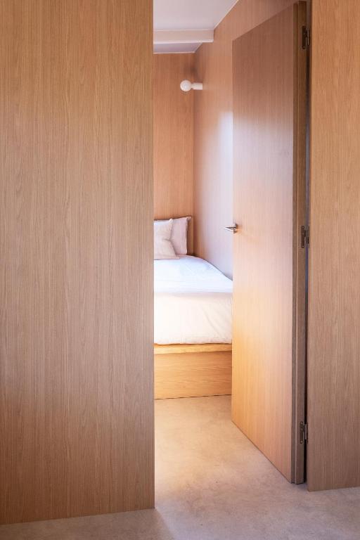 Postel nebo postele na pokoji v ubytování Wecamp San Sebastián