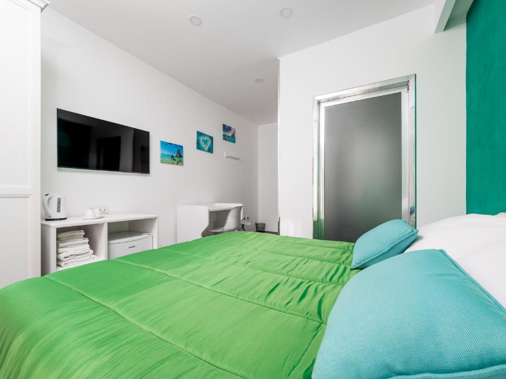 Postel nebo postele na pokoji v ubytování Amore&Psiche - De Vivo Realty Sorrento