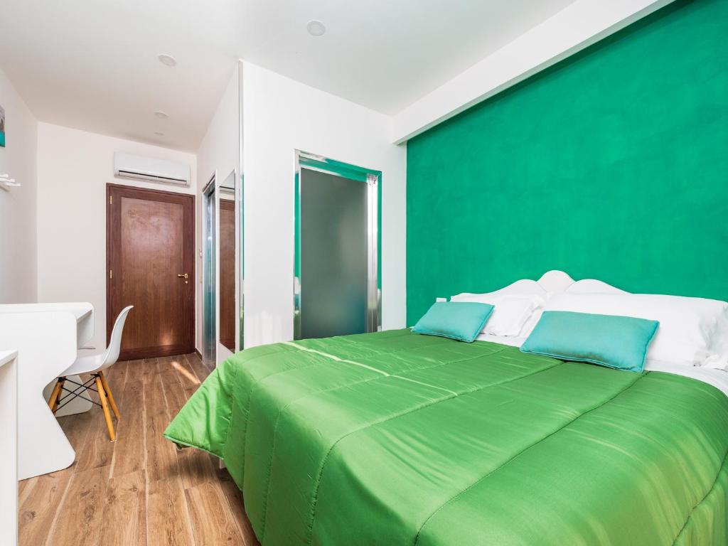 Postel nebo postele na pokoji v ubytování Amore&Psiche - De Vivo Realty Sorrento