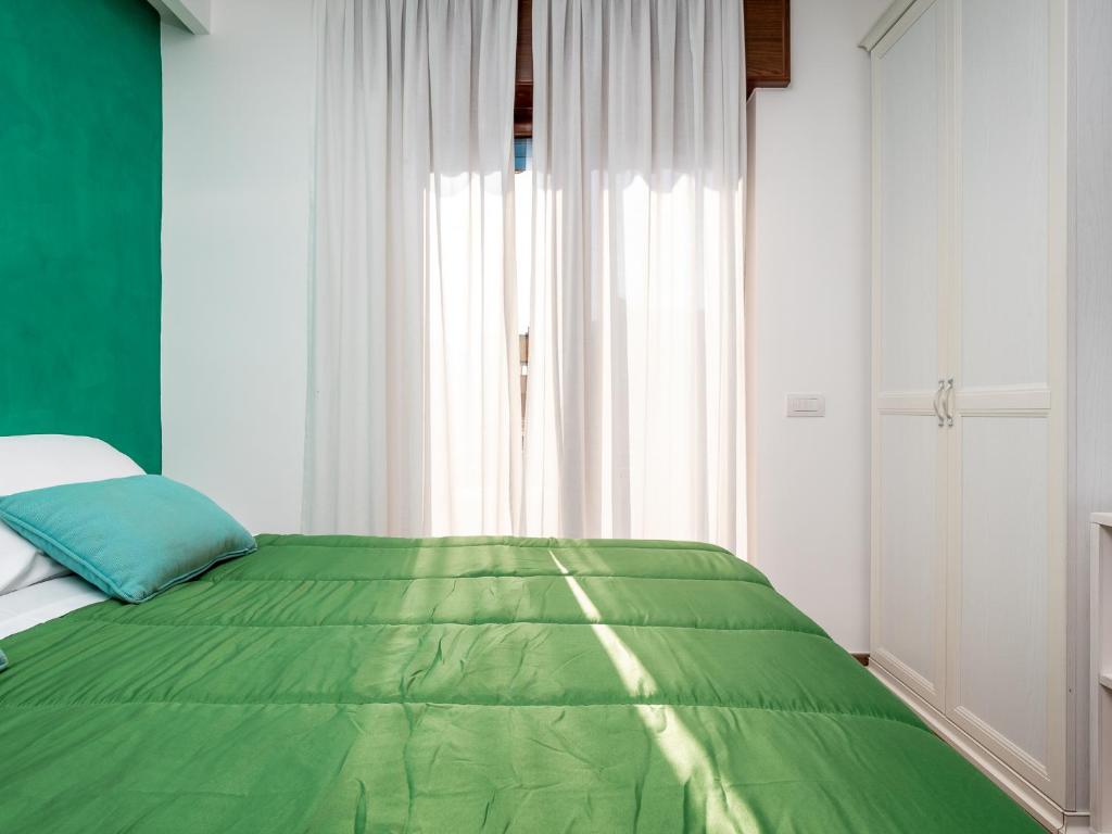 Postel nebo postele na pokoji v ubytování Amore&Psiche - De Vivo Realty Sorrento