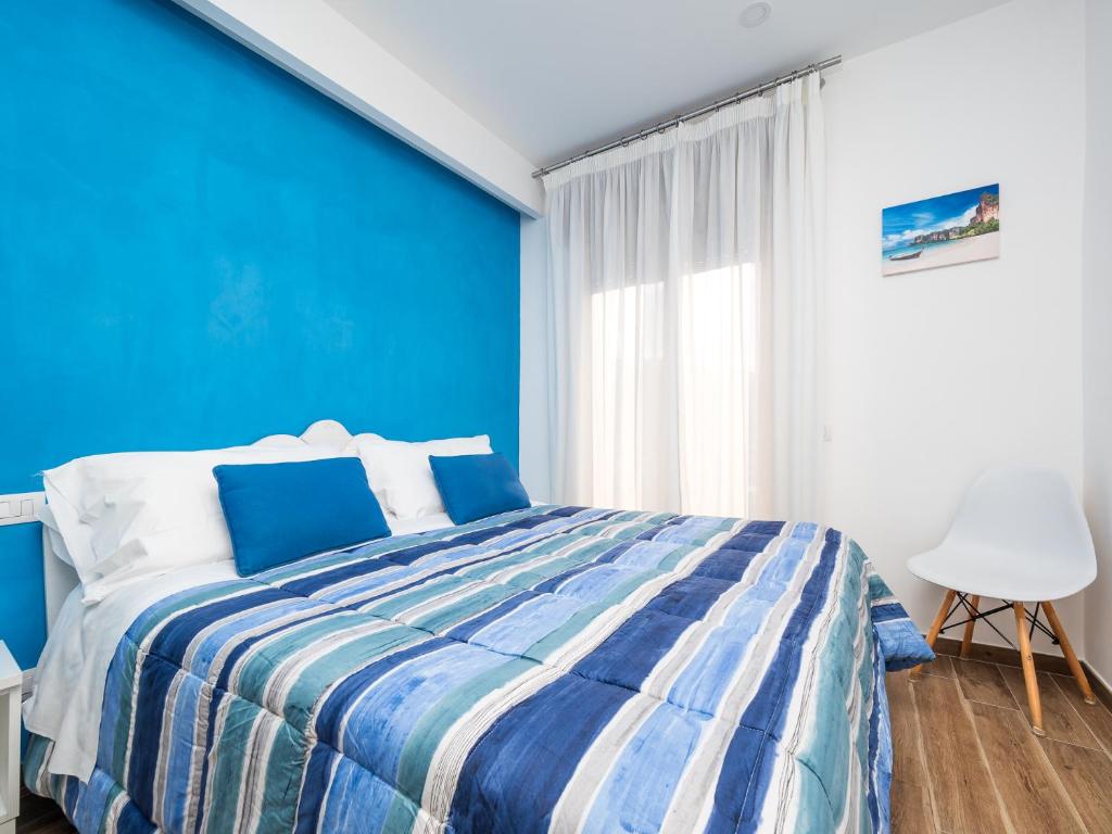 Postel nebo postele na pokoji v ubytování Amore&Psiche - De Vivo Realty Sorrento