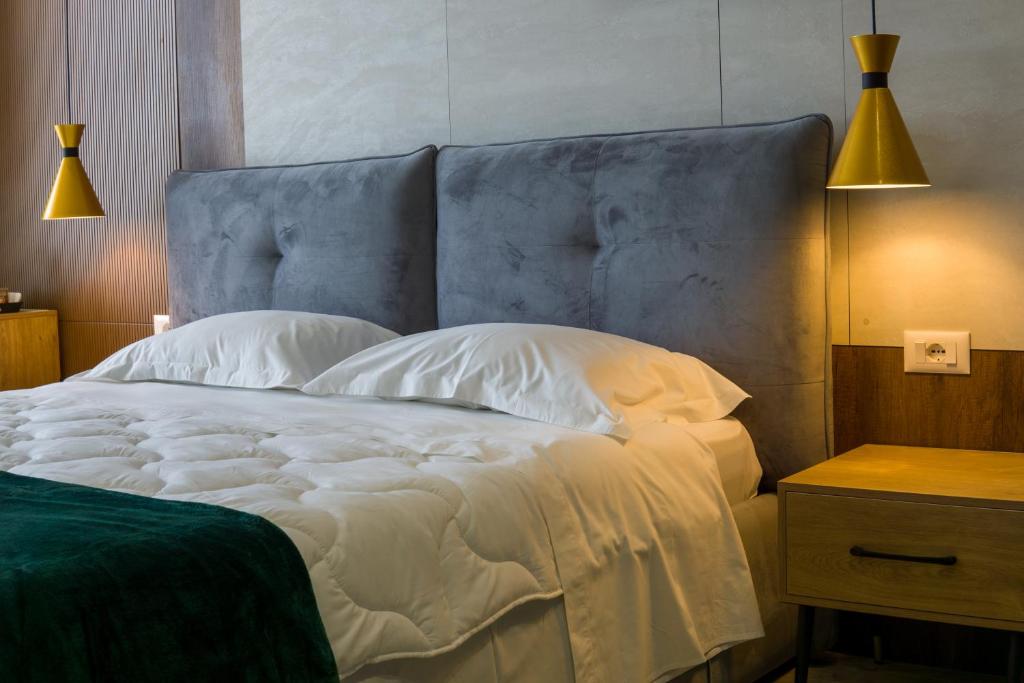 Uma cama ou camas num quarto em Hotel Morfeus