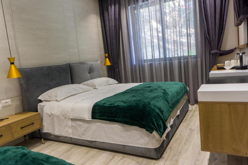 Uma cama ou camas num quarto em Hotel Morfeus