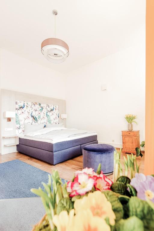 Postel nebo postele na pokoji v ubytování Hotel Bayrischer Hof