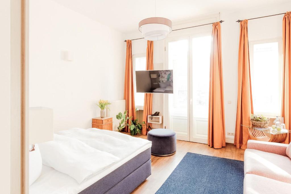 Postel nebo postele na pokoji v ubytování Hotel Bayrischer Hof
