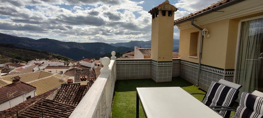 a balcony with a view of a city at Casa Carmen in Faraján