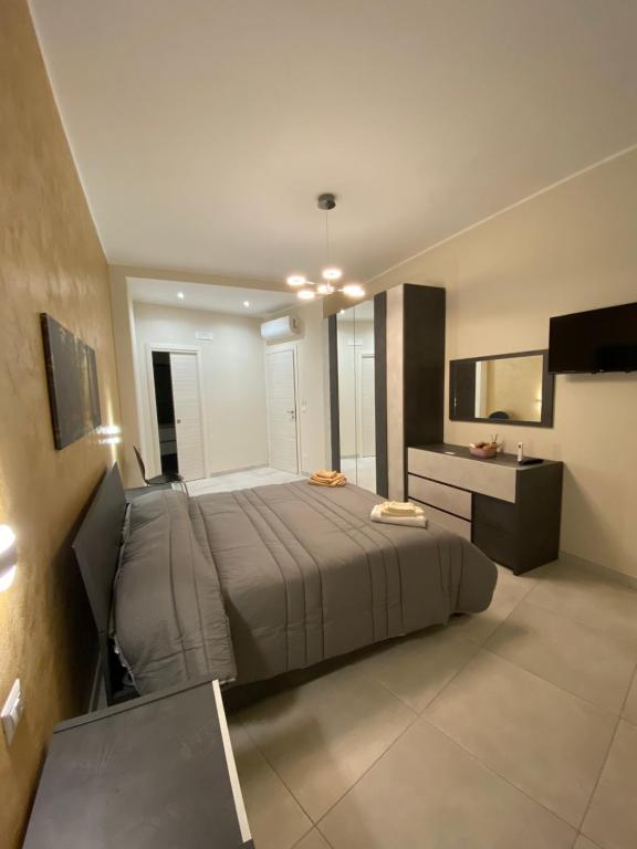 Posteľ alebo postele v izbe v ubytovaní B&B San Giuseppe, nel cuore di Ortigia
