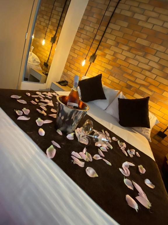 Postel nebo postele na pokoji v ubytování Hotel D' Leon