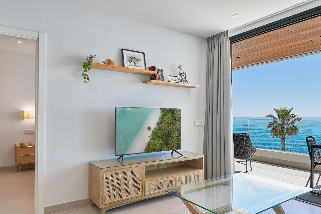 TV a/nebo společenská místnost v ubytování Rincón Mediterráneo