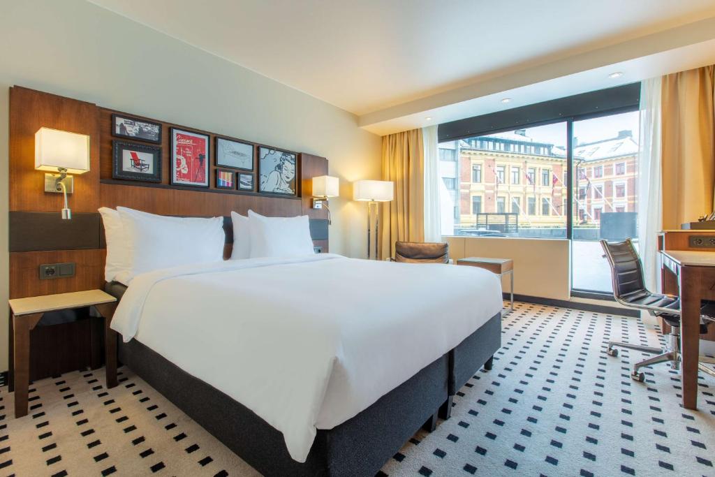 Postel nebo postele na pokoji v ubytování Radisson Blu Scandinavia Hotel, Oslo