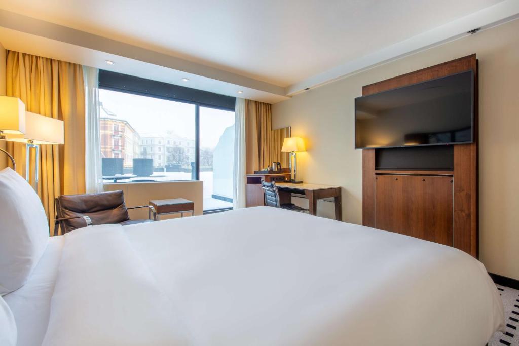 Postel nebo postele na pokoji v ubytování Radisson Blu Scandinavia Hotel, Oslo