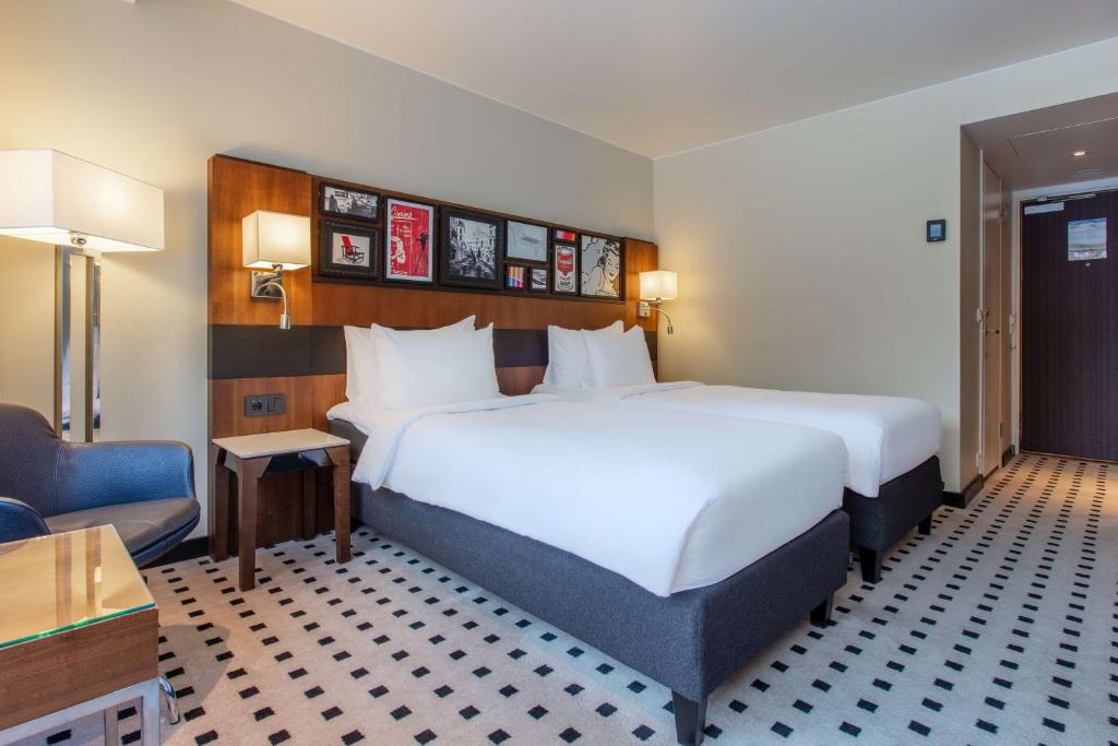Postel nebo postele na pokoji v ubytování Radisson Blu Scandinavia Hotel, Oslo