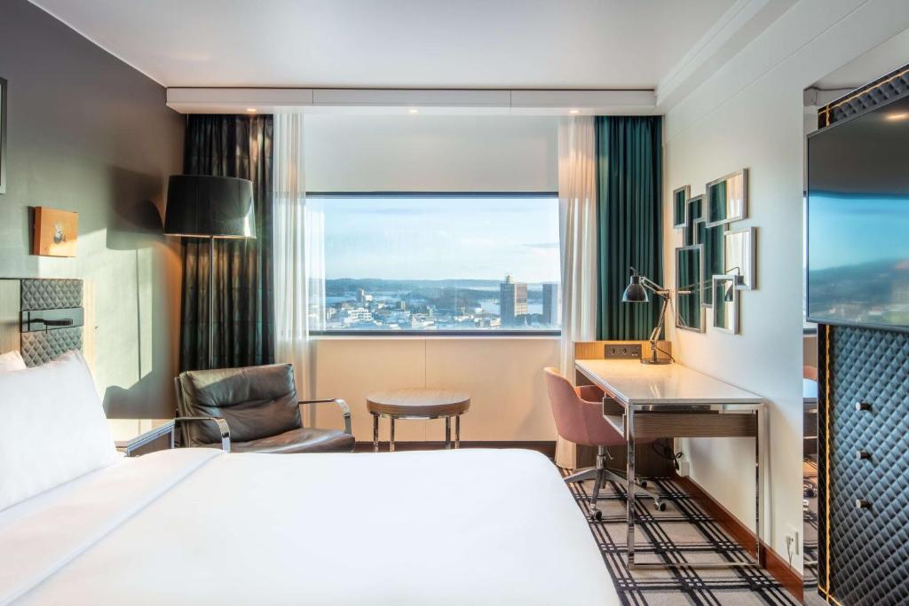 Postel nebo postele na pokoji v ubytování Radisson Blu Scandinavia Hotel, Oslo