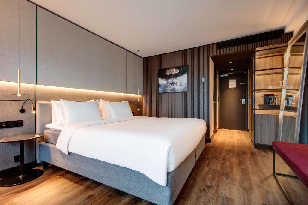 Postel nebo postele na pokoji v ubytování Radisson Blu Scandinavia Hotel, Oslo