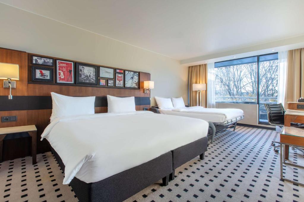 Postel nebo postele na pokoji v ubytování Radisson Blu Scandinavia Hotel, Oslo