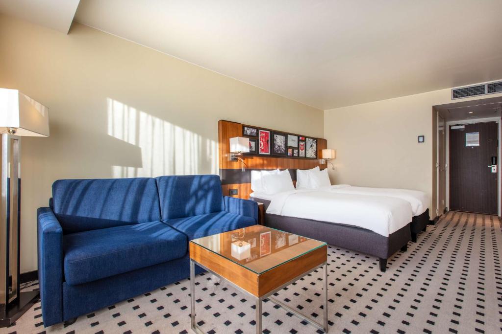 Postel nebo postele na pokoji v ubytování Radisson Blu Scandinavia Hotel, Oslo