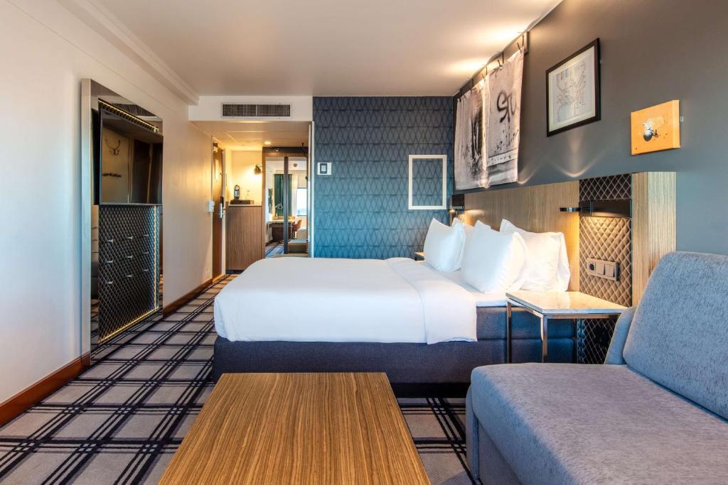Postel nebo postele na pokoji v ubytování Radisson Blu Scandinavia Hotel, Oslo