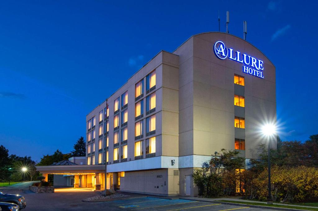 a rendering of a hotel at night at Allure Hotel & Conference Centre, Ascend Hotel Collection in Barrie