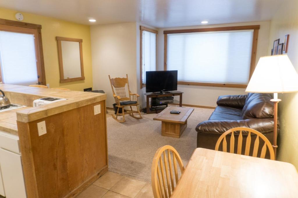 a living room with a couch and a table at 4081 Ski Trails in Truckee