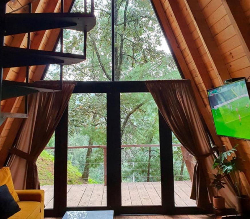 TV a/nebo společenská místnost v ubytování Hotel Sierra Tigre