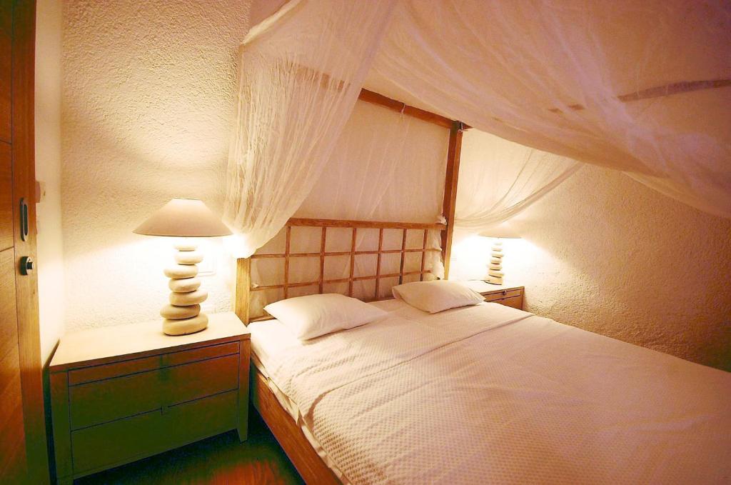 Łóżko lub łóżka w pokoju w obiekcie Boutique Hotel Placa
