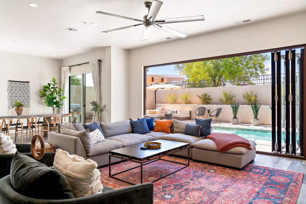 a living room with a couch and a table at Eagle On The 8th 2283 - 7 Bed, Private Pool- Hot Tub With Mounta in Washington