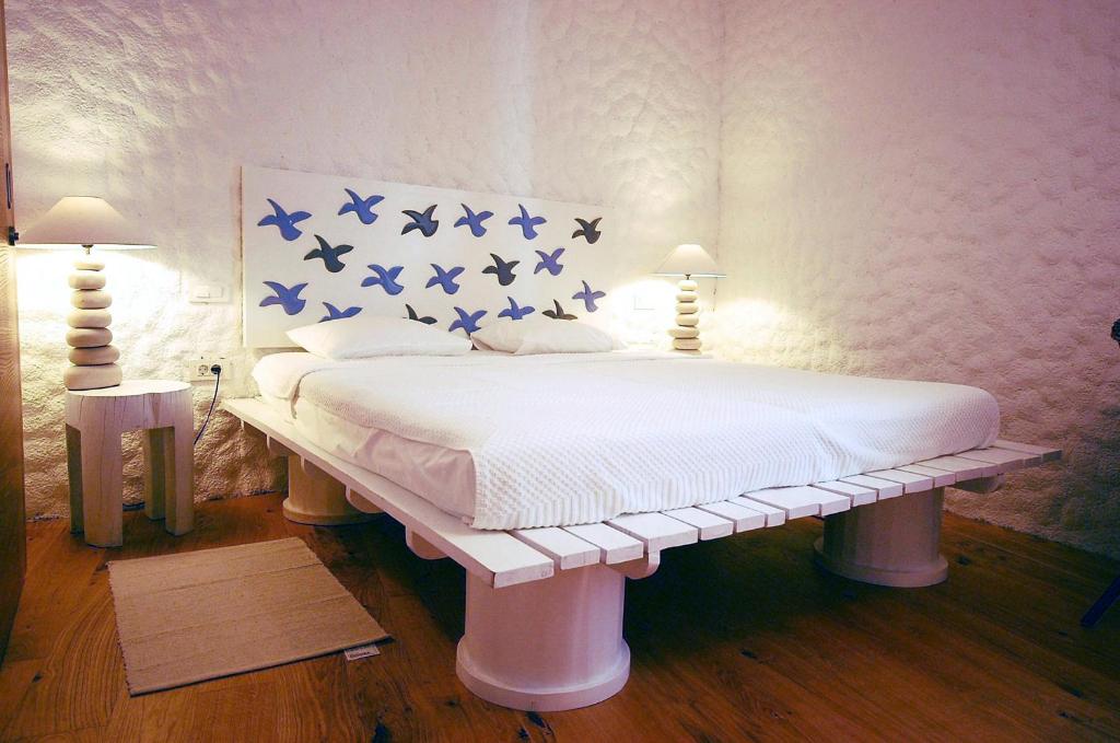 Łóżko lub łóżka w pokoju w obiekcie Boutique Hotel Placa