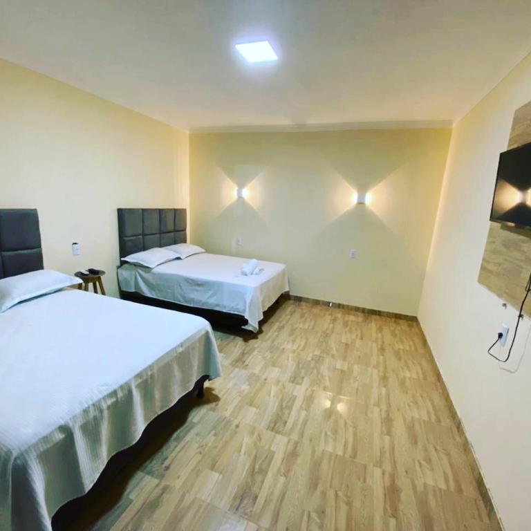 Postel nebo postele na pokoji v ubytování Pousada vista alegre