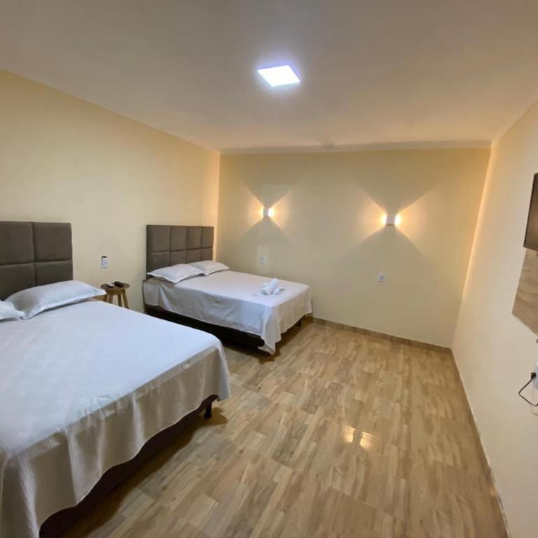Postel nebo postele na pokoji v ubytování Pousada vista alegre