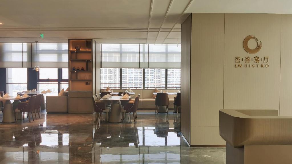 Posezení v ubytování Guangzhou Pazhou LN DongFang Hotel-Free shuttle between hotel and Exhibition Center during Canton Fair & Exhibitor Registration Counter