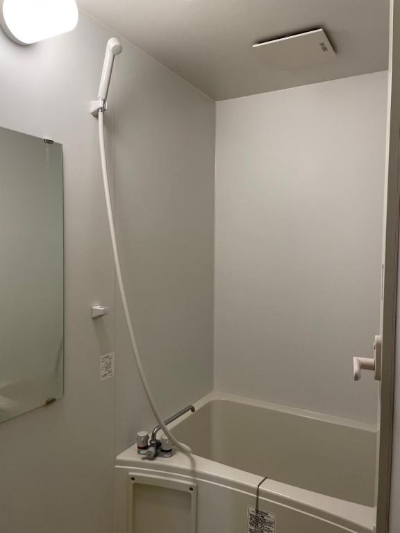 Koupelna v ubytování Karin doo Hotel
