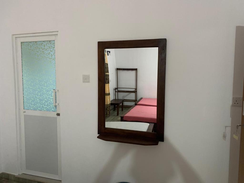 Postel nebo postele na pokoji v ubytování Kumudu Holiday Home