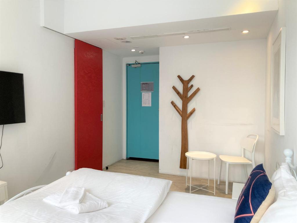 Postel nebo postele na pokoji v ubytování 4Plus Hostel