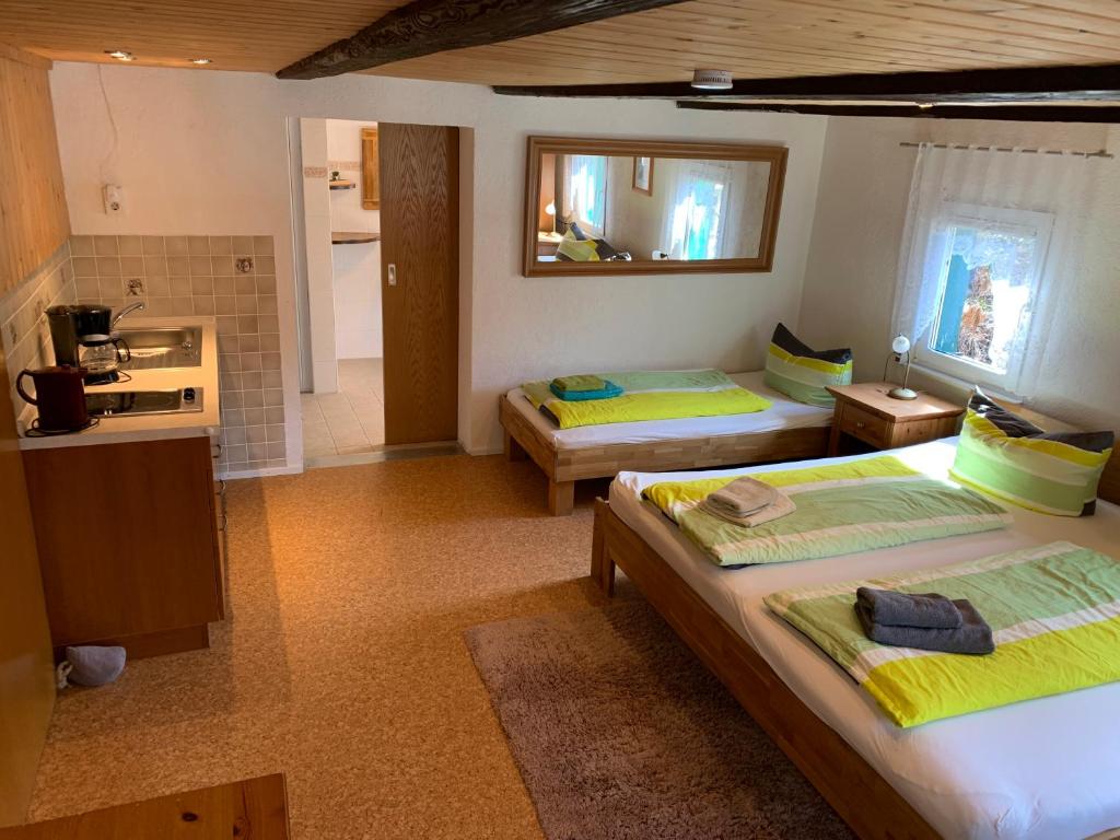 Postel nebo postele na pokoji v ubytování Haus Bergfriede