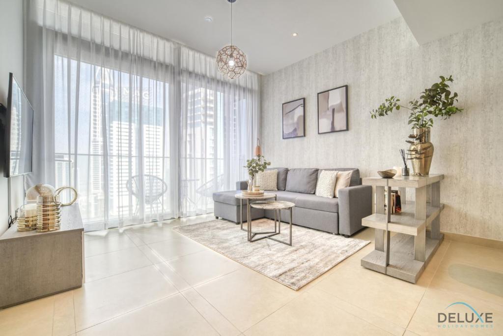 Posezení v ubytování Surreal 1BR at The Residence Marina Gate 2 Dubai Marina by Deluxe Holiday Homes