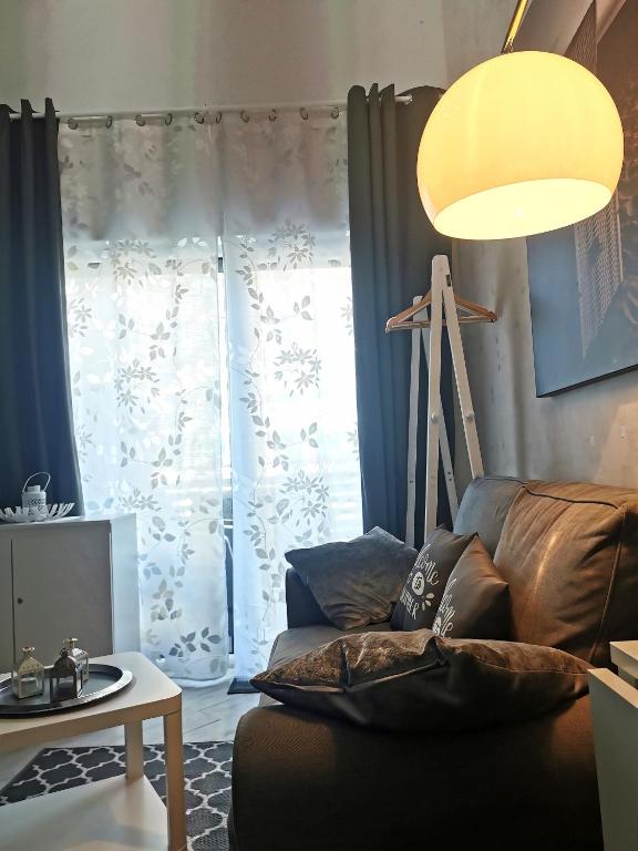 Posedenie v ubytovaní STRANDIDYLLE Apartment mit Meerblick und Kamin