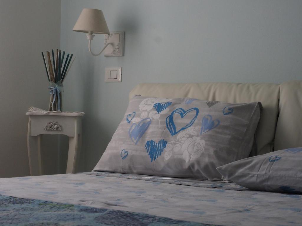 A bed or beds in a room at Casa vacanze Lepa Vida
