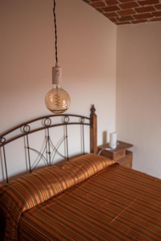 Postel nebo postele na pokoji v ubytování Nutrilamente country house
