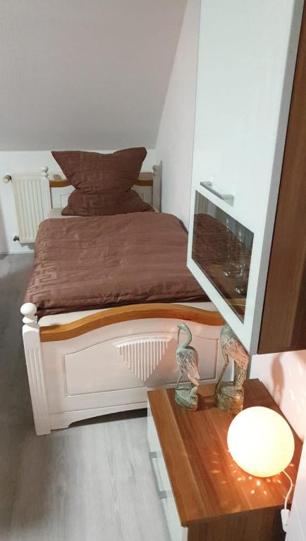 Postel nebo postele na pokoji v ubytování Ferienwohnung 24 Oben Rechts 4 Zimmer