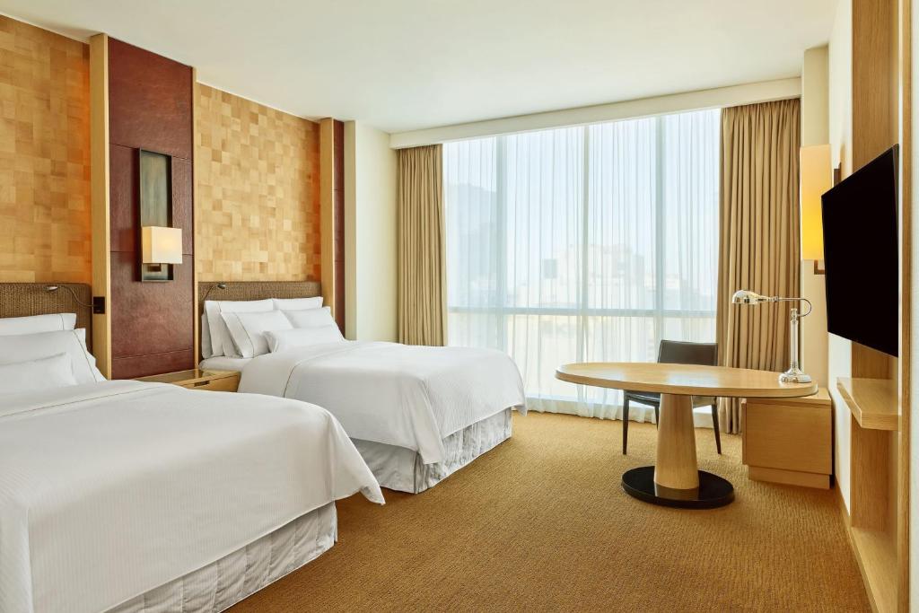 Voodi või voodid majutusasutuse The Westin Lima Hotel & Convention Center toas