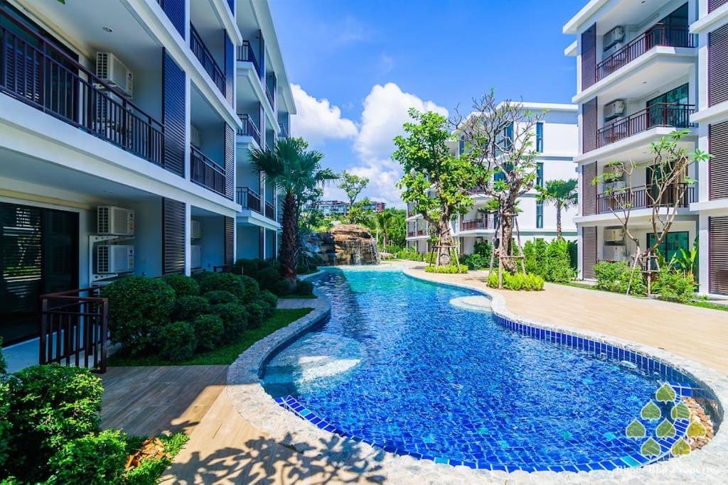 a swimming pool in the middle of a building at Title III and II by Villacarte in Rawai Beach