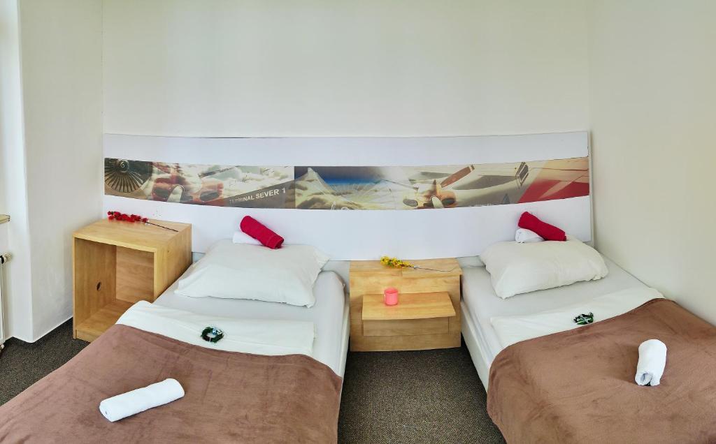Postel nebo postele na pokoji v ubytování Hotel Stará Škola