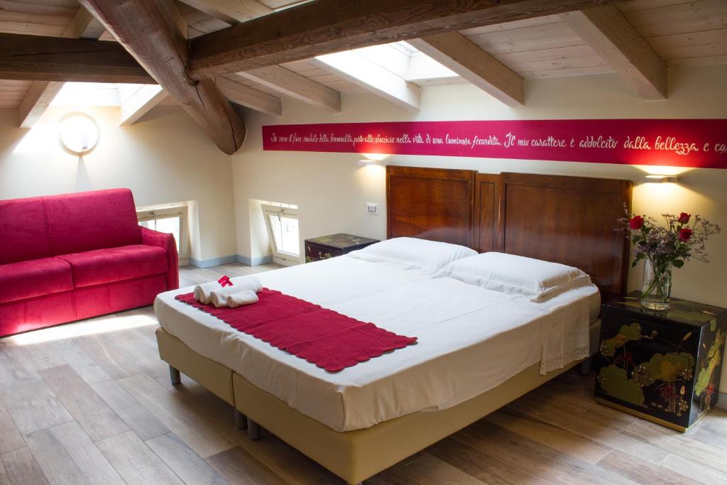 Postel nebo postele na pokoji v ubytování Villa di Cazzano - BioLuxury Living
